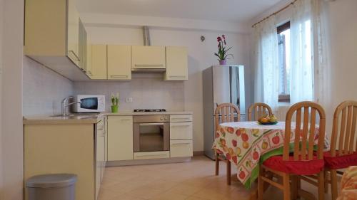 Kuhinja oz. manjša kuhinja v nastanitvi Apartments Libera