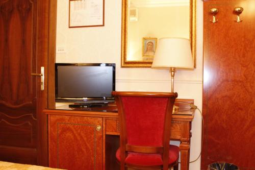 Kuchyň nebo kuchyňský kout v ubytování Hotel Genio