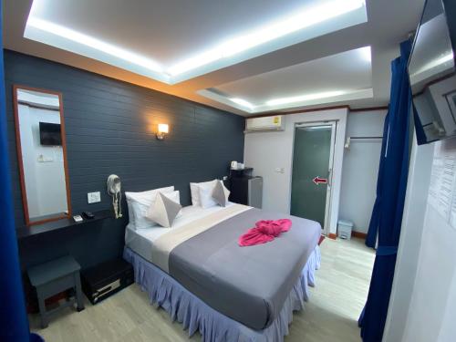 Кровать или кровати в номере Sinsamut Koh Samed