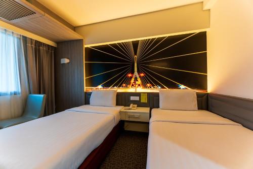 Кровать или кровати в номере Royal Delight Hotel