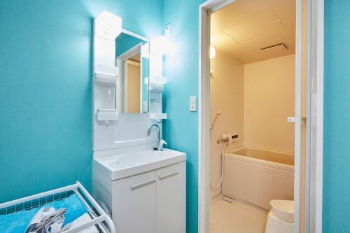 ห้องน้ำของ 松戸 テイクファイブ - 水色1DK Nomad松戸宿015