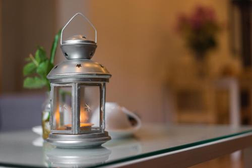 a lantern sitting on top of a table at HNC Premier Hotel & Residences in Hanoi