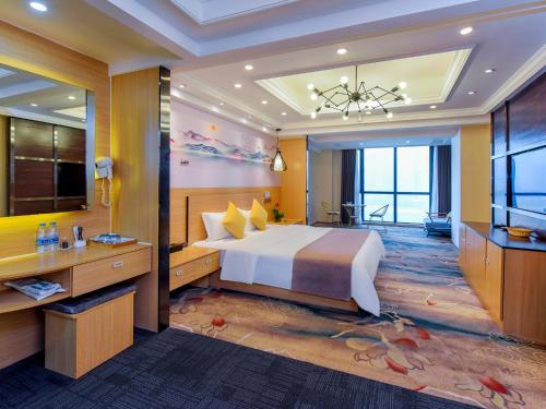 Tempat tidur dalam kamar di Chongqing Ouranjian Lake View Guesthouse