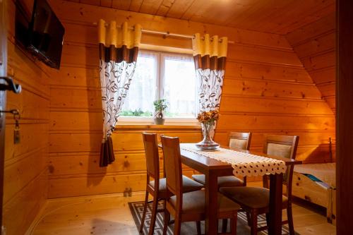 TV a/nebo společenská místnost v ubytování Zagroda na zakręcie