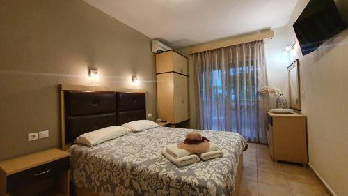 A bed or beds in a room at House Spanos