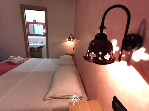 Letto o letti in una camera di La Suscella Bed & Breakfast