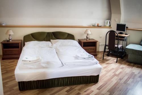 Postel nebo postele na pokoji v ubytování Hubert Varga