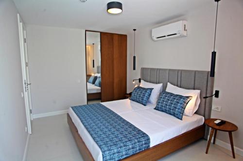 Postel nebo postele na pokoji v ubytování Queen Residences & Apart Hotel