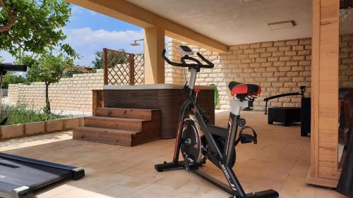 The fitness center and/or fitness facilities at Residence Del Tellaro