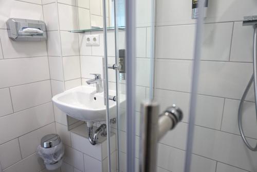 Ένα μπάνιο στο Apartment Hotel Wittenau