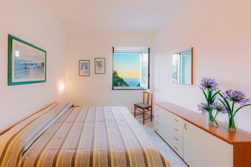 Postel nebo postele na pokoji v ubytování Villa San Lorenzo