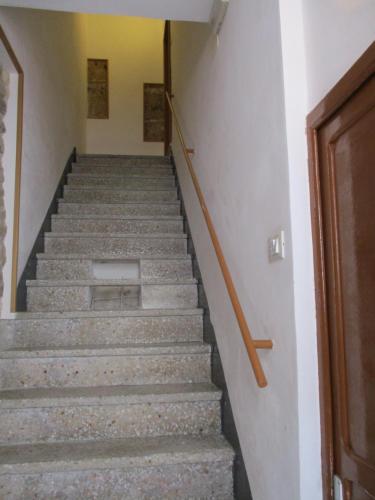 a set of stairs in an old building at Casa Il Pesco in Noto