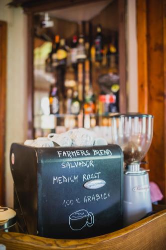 a box on a table with a wine glass at Turnovská chata in Kořenov