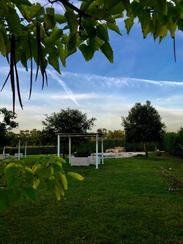 Jardín al aire libre en SU PASSU Country House