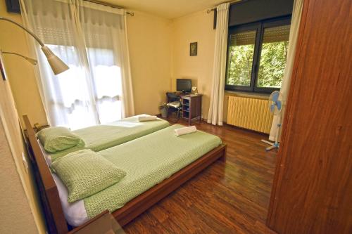 Ένα ή περισσότερα κρεβάτια σε δωμάτιο στο B&B La Casa Nel Bosco