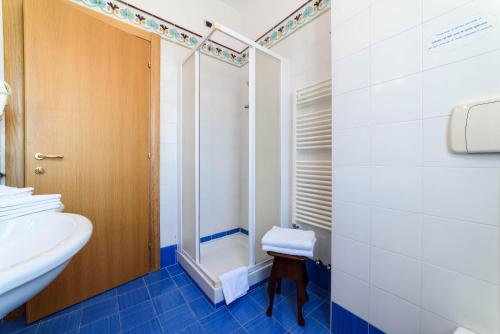 a bathroom with a sink and a shower at Hotel Hermitage in Polla