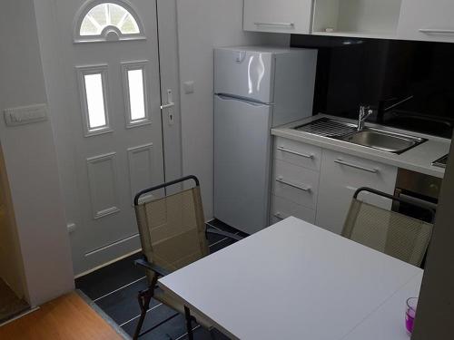 Kuchyňa alebo kuchynka v ubytovaní Apartment Mali