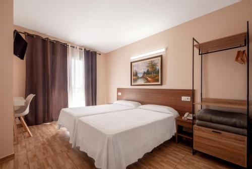 Krevet ili kreveti u jedinici u objektu Hotel Silvia