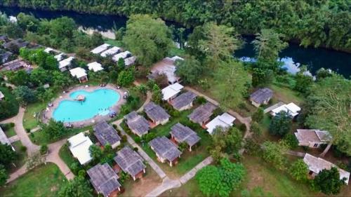 an aerial view of a group of houses and a pool at Nakakiri Resort & Spa in Hin Dat