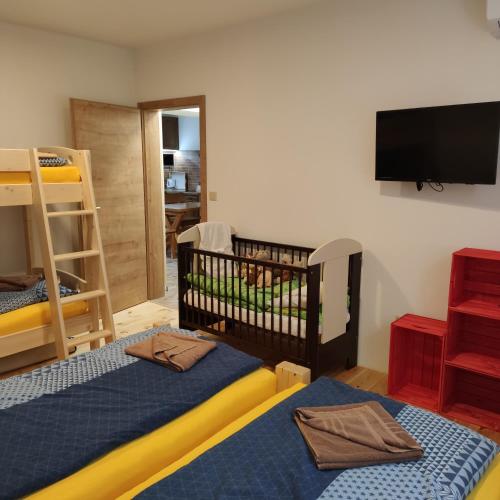 Postel nebo postele na pokoji v ubytování Apartmán Špacír