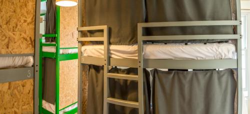 a couple of bunk beds in a room at Park Villa Boutique Hostel in London
