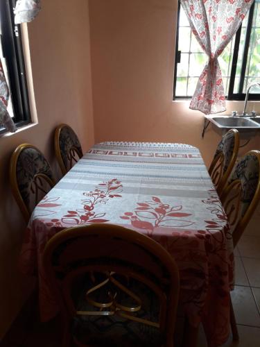 a table with a table cloth on it in a room at Familia Sosa Suazo in San José del Cabo