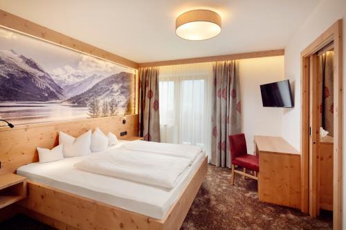 Hotel Gasthof Abelhof tesisinde bir odada yatak veya yataklar