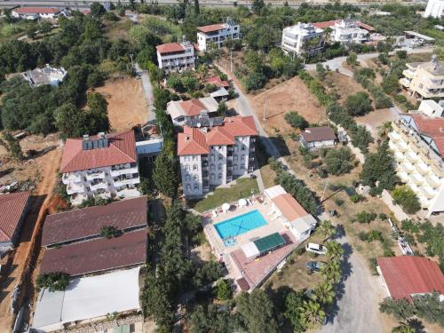 an aerial view of a house with a swimming pool at Sercan Apart in Kızılot