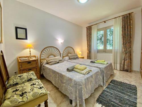 Ένα ή περισσότερα κρεβάτια σε δωμάτιο στο Torre Vella