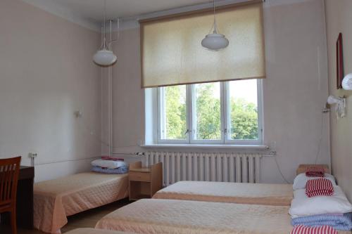 Cama o camas de una habitación en Hostel Lõuna