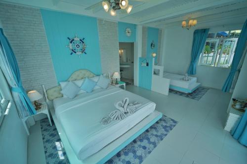 a rendering of a bathroom with a large tub at DD Hut Koh Tao in Koh Tao