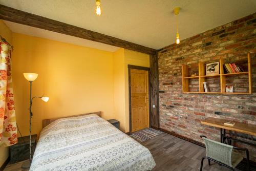 Ein Bett oder Betten in einem Zimmer der Unterkunft Jaunie Pātari