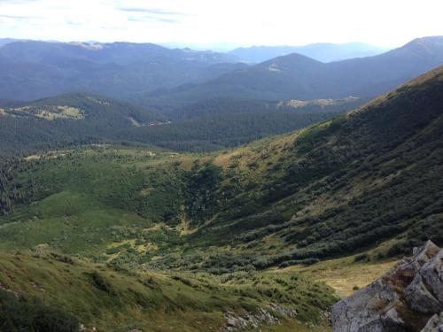 a view of a valley with mountains in the background at Eco Sadyba Familia in Yaremche