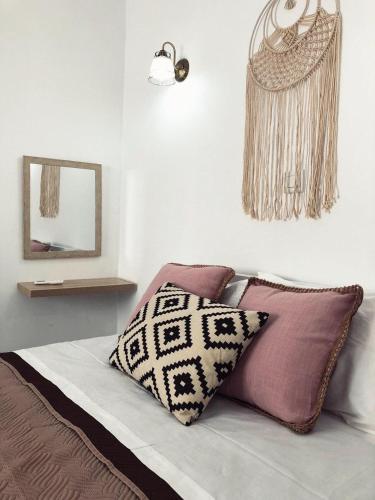 Postel nebo postele na pokoji v ubytování Katsikantaris Homes
