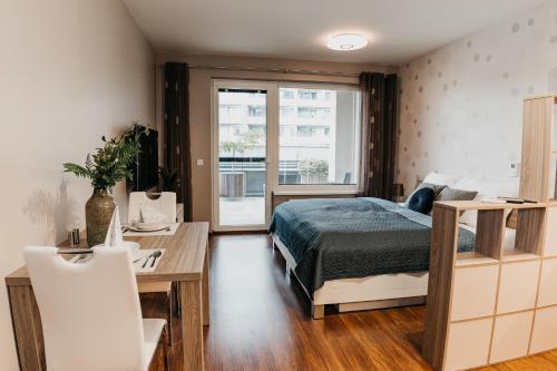 A bed or beds in a room at AH Radnica II Free Parking