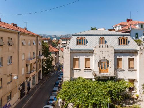 an aerial view of a city street with buildings at Flos Luxury Rooms in Split