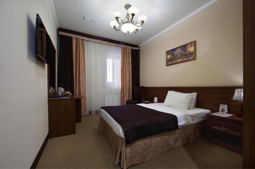 Posteľ alebo postele v izbe v ubytovaní Amici Grand Hotel
