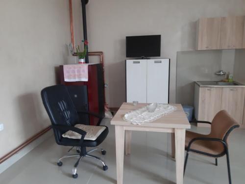 Η κουζίνα ή μικρή κουζίνα στο apartman