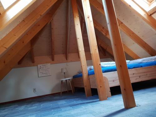 Postel nebo postele na pokoji v ubytování Vakantiebungalow Otterlo