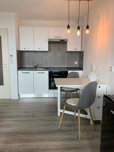 Dapur atau dapur kecil di Ferienappartment Tom Kyle