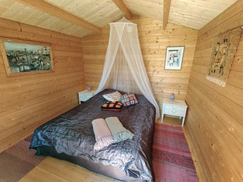 מיטה או מיטות בחדר ב-Villa Kesäranta