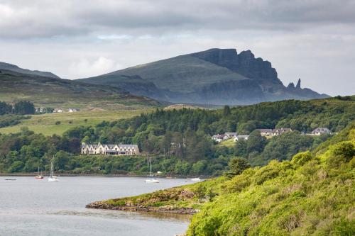 a view of a body of water with boats in it at Cuillin Hills Hotel in Portree