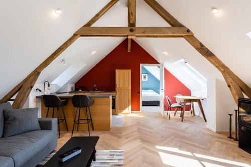 a kitchen and living room with a large attic at HARAS DE BARRY in Sainghin-en-Mélantois