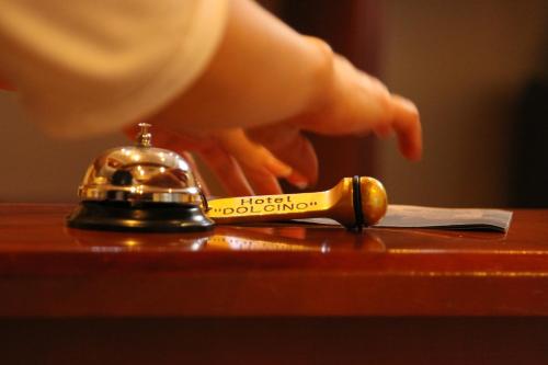 a hand is reaching for a hudson at Accommodation Dolcino in Ulcinj