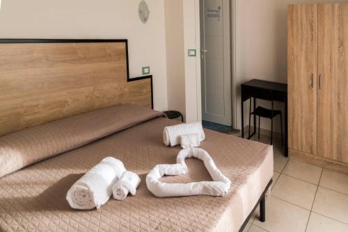 Postel nebo postele na pokoji v ubytování My Hotel Cesenatico