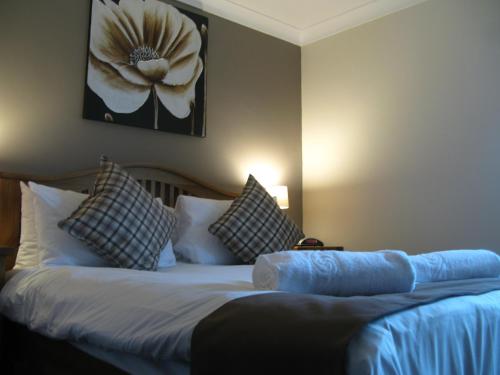 Cama o camas de una habitación en The Chequers Inn