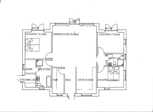 a black and white floor plan of a house at Ferienhaus Chalet Goldberg in Bad Harzburg
