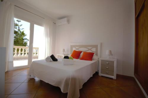 Кровать или кровати в номере Villa Cunill
