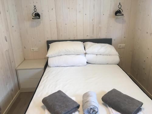 Voodi või voodid majutusasutuse Jolster sauna apartments toas