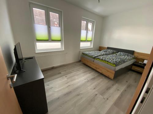 Postel nebo postele na pokoji v ubytování Ferienwohnung 90m² 2-6 Personen